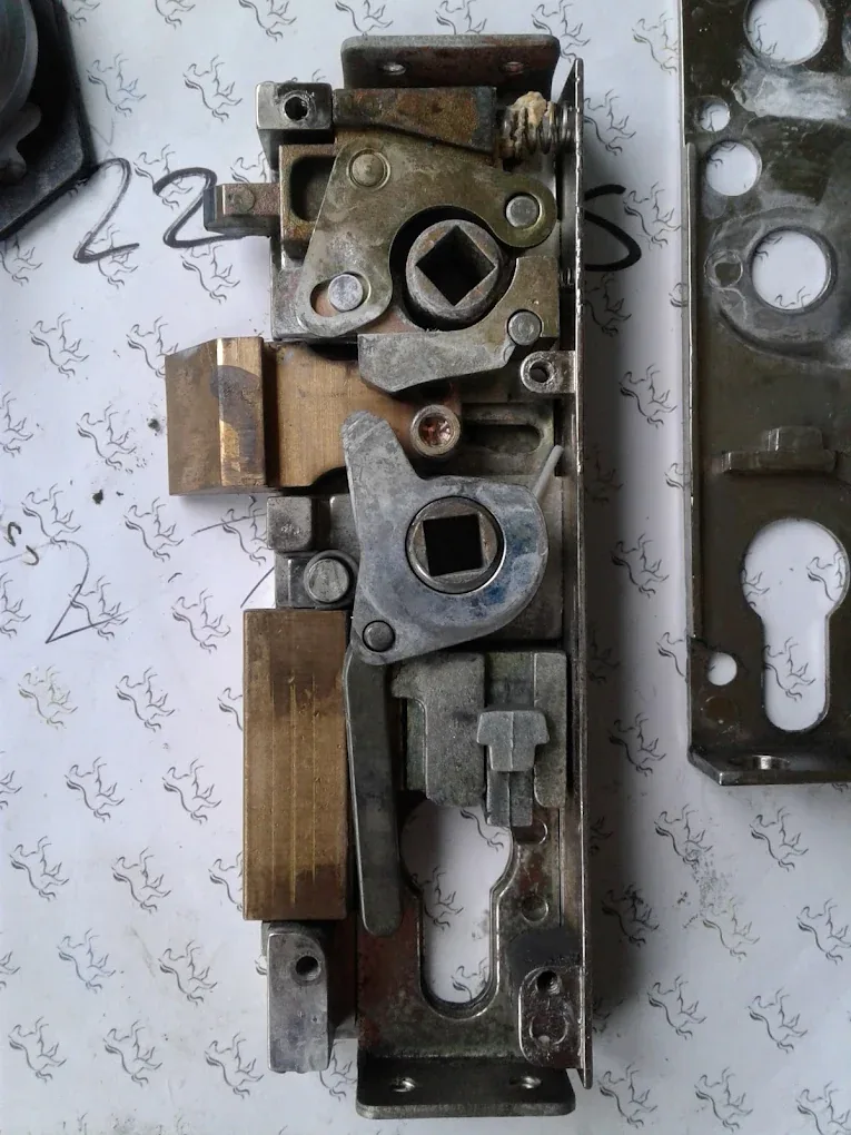 Worn uPVC multipoint gearbox removed for replacement